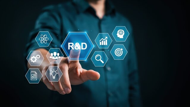 Businessman touching digital r and d research and development icons on screen