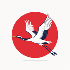 Fototapeta premium Japanese Crane Flying in Front of Red Sun