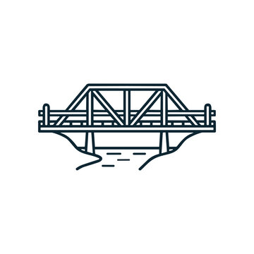 Steel truss bridge over waterway.