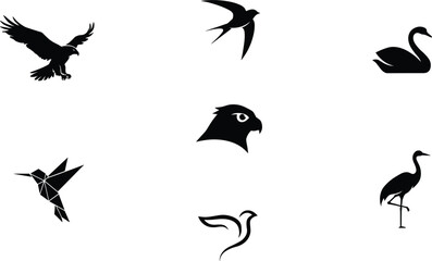 Fototapeta premium Wild birds black silhouettes vector icons set featuring flying eagle swallow swan hummingbird flamingo hawk and dove symbols isolated on white background
