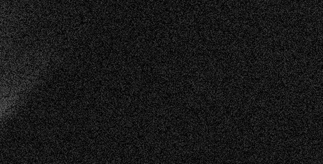 Fototapeta premium a close-up of a dark, grainy, static-filled television screen with digital noise and flickering signals