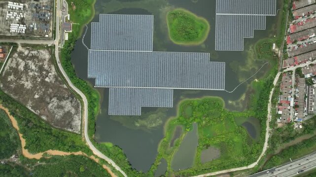 Expansive Floating Solar Farm on Water Body, Aerial View