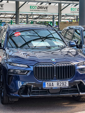 Prague, Czech Republic - June 20, 2026: BMW X7 luxury SUV displayed at a used-car marketplace, illustrating premium automotive retail, consumer demand and second-hand vehicle sales.