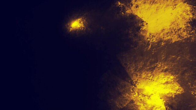 Glowing golden cavern rock texture abstract motion graphic background video, molten lava inspired illuminated stone surfaces with deep shadows, cinematic loop animation design for dramatic projects