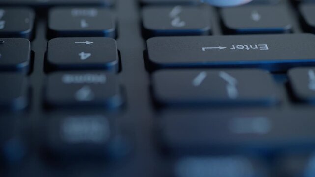 Closeup caucasian finger hitting enter, arrow symbol on keycap, cool cinematic light, blurred background, decisive launch or compile moment, tense macro focus