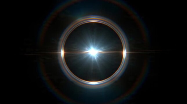 Bright light shining through circular opening.