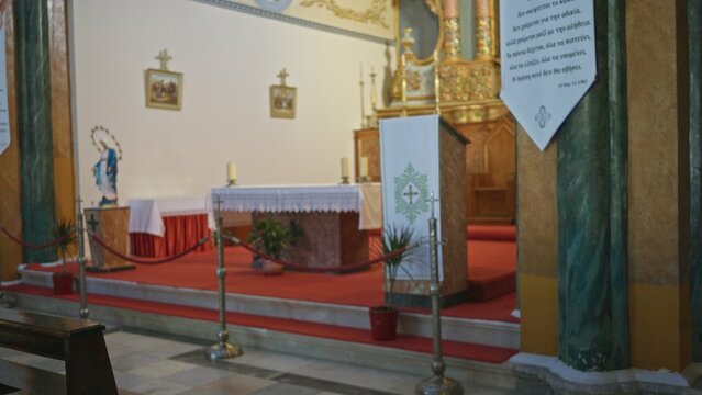 Church interior with soft defocused altar and red carpeted chancel, shallow blur on columns and ropes; background backplate copyspace calm.