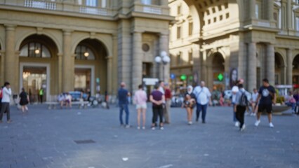Blurred urban plaza with shallow bokeh focus on historic arched facade and paved square details  background calm. © Krakenimages.com