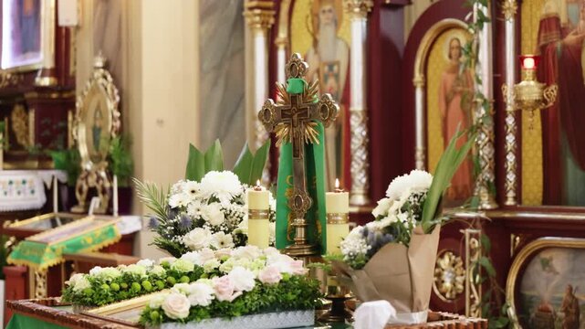 The altar cross in the interior of the church. The church cross lie on the throne. Subjects of religious subjects. Beautiful Catholic Church