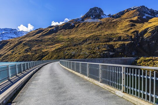 Road on the dam wall of the Moiry reservoir, near Grimentz, Val d'Anniviers, Valais Alps, Canton Valais, Switzerland