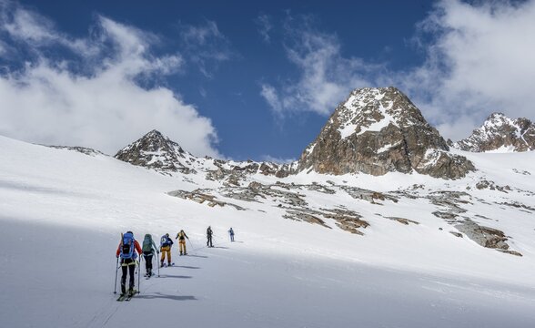 Group of ski tourers in winter in the mountains, Neustift im Stubai Valley, Tyrol, Austria