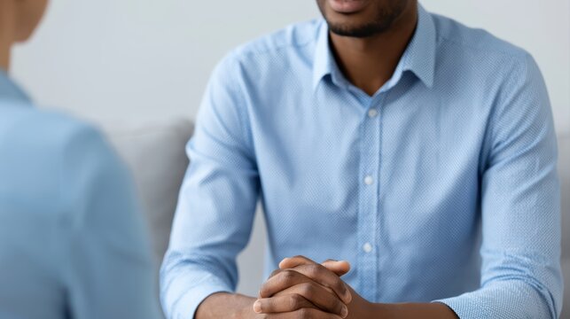 A therapist providing support during a counseling session, compassionate communication and mental health awareness theme