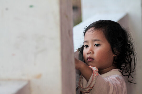 Portrait of a child with a calm and thoughtful expression