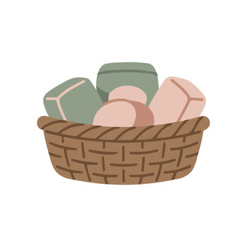 Brown wicker basket filled with soap.