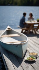 Obraz premium Canoe and Fresh Food on Dock with Couple Dining by Sparkling Lake