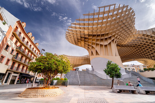 Everyday life on streets touristic European city, Plaza de la Encarnaci&oacute;n, Setas de Sevilla, Spain, Andalusia.