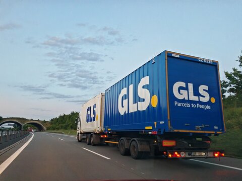 Prague,Czech Republic-April 2 2026: GLS delivery truck entering logistics distribution center for parcel transportation and supply chain operations