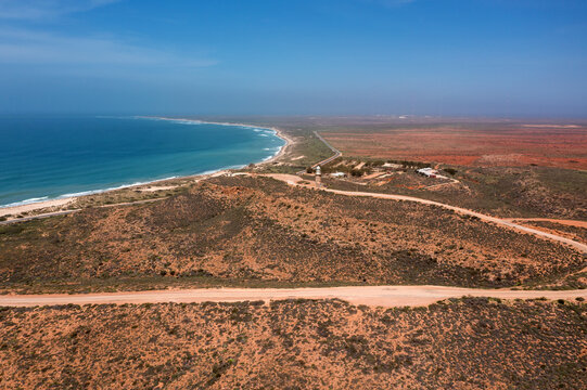 Aerial View overlooking the Indian Ocean and the die Lighthouse Bay, Vlamingh Head Lighthouse, Harold E. Holt Communication Station VLF Towers, Western Australia 