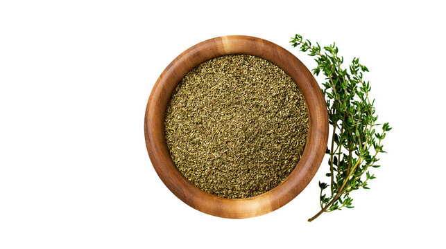 Dried thyme herb in wooden bowl with fresh thyme sprigs