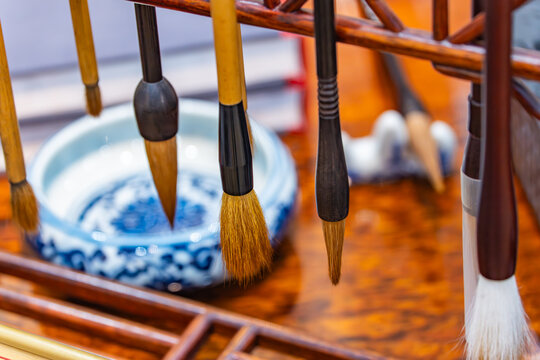 Chinese writing brushes and inkstone on the table,the word mean make of brush