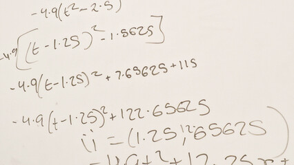 Naklejka premium Close up of maths equations on a whiteboard