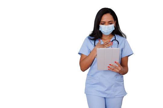 Healthcare professional in scrubs and mask holding tablet, experiencing relief or gratitude, transparent background