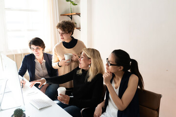 Fototapeta premium Team collaboration in bright office.