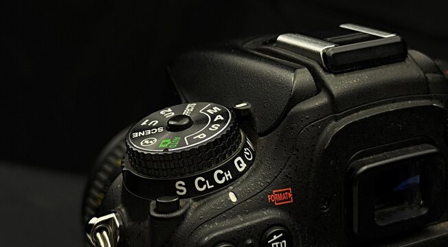 Macro shot of a digital camera shutter button and power switch 