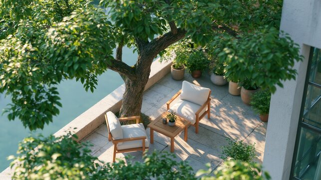 Peaceful outdoor patio with wooden chairs and a green tree
