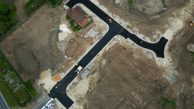 The aerial view highlights the new fresh road at Bellway in Boroughbridge. The area is under development with machinery and materials preparing for future use