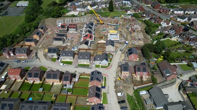 Aerial views showcase the new Noble Homes development in Knottingley UK. The video highlights construction progress and the surrounding area. This is a look at a developing community and its features