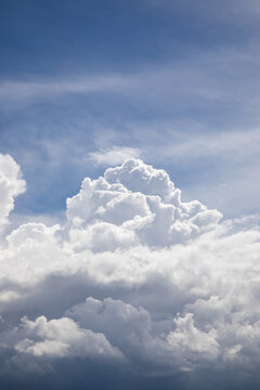 Puffy white clouds and a blue sky no people portrait