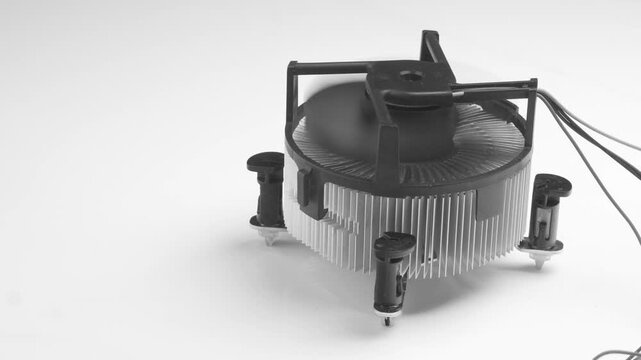Spinning cpu processor cooler with heatsink isolated on white background. 4K