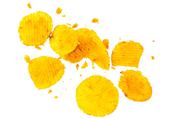Naklejka premium potato chips and crumbs float dynamically against a clean white background. 