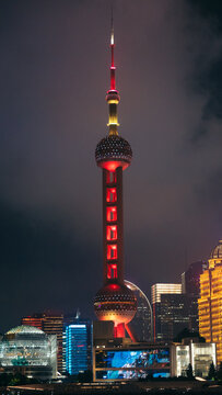 Oriental Pearl Tower illuminated at night in Shanghai