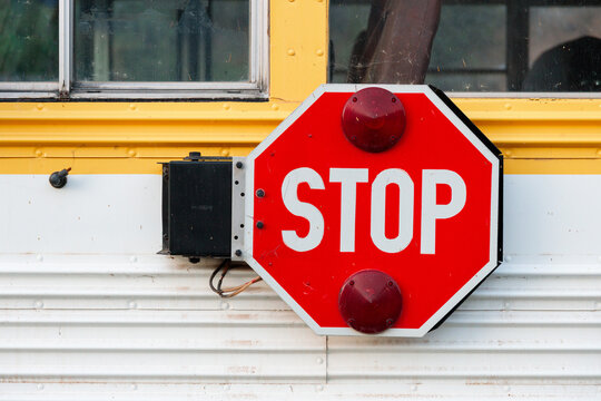 School bus stop sign close up