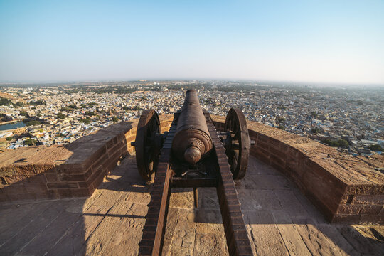 Ancient iron cannon on the stone ramparts of Mehrangarh Fort 