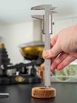 analogue vernier caliper used to measure the depth of an object