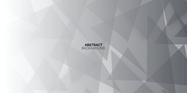 Modern abstract background with grey geometric triangles and gradient.