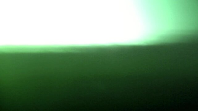 A soft light burn transition with warm illumination and elegant dissolve movement.