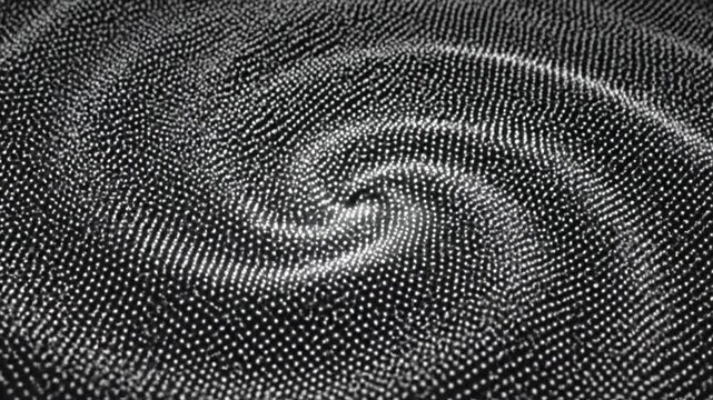 Abstract motion graphics showing white glowing particles swirling in dark