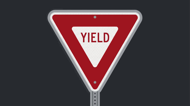 Red and white triangular yield sign indicating drivers to slow down and give way to other vehicles on the road