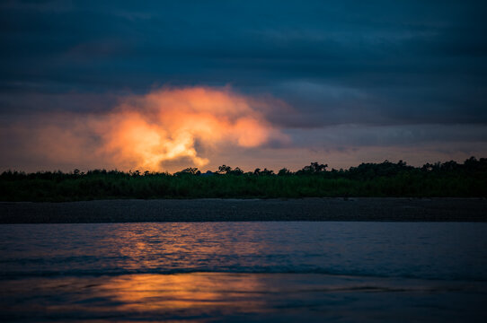 sunset over the Amazon river in the jungle of Peru