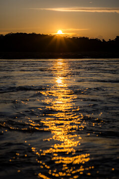 Sunset on the Amazon river in Peru.
