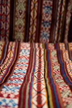 Details of women weaving in the Sacred Valley near Cusco in Peru.