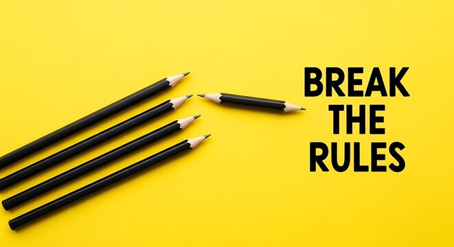 Break the Rules motivational text on yellow background, black pencils in different directions, creative thinking and non-conformity concept