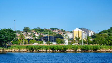 Obraz premium Coastline and cityscape in a hill, Niteroi, Rio de Janeiro, Brazil