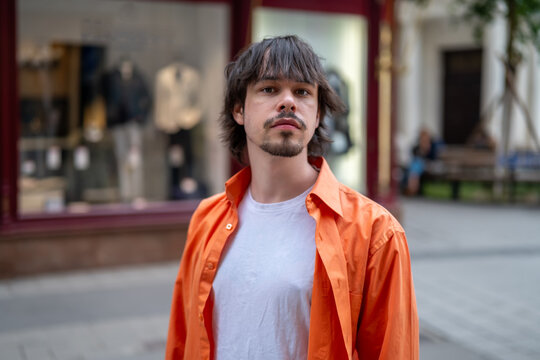Portrait of a twenty five year old man in casual clothing on an urban