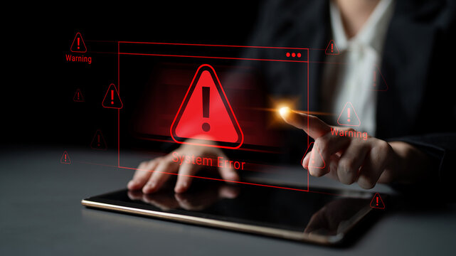 A person interacting with a tablet showing a digital system error alert. Emphasizing technology challenges and the importance of security in modern devices. Cyphers