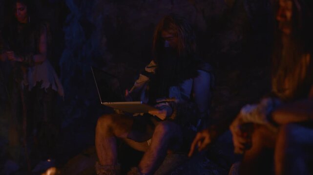 Cavemen Leveraging Modern Technology Within a Primitive Setting While Cultivating Their Creativity